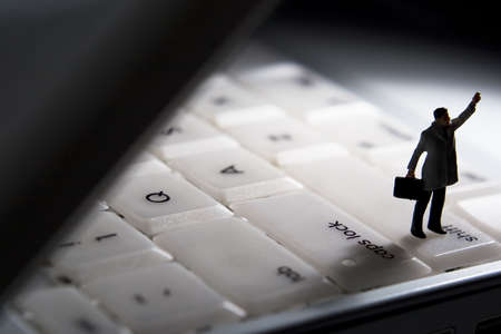 Business figurine and computerの写真素材