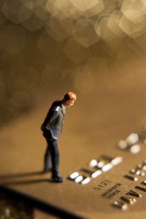 Business figures and credit cardの写真素材