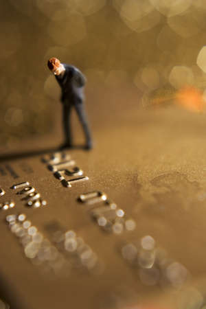 Business figures and credit cardの写真素材