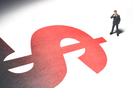 Business figures and dollar signの写真素材