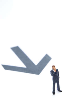 Business figures and arrowの写真素材