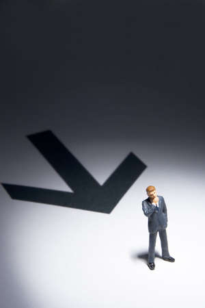 Business figures and arrowの写真素材