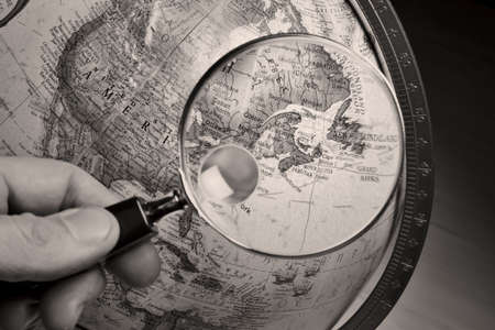 Globe and magnifying glassの写真素材