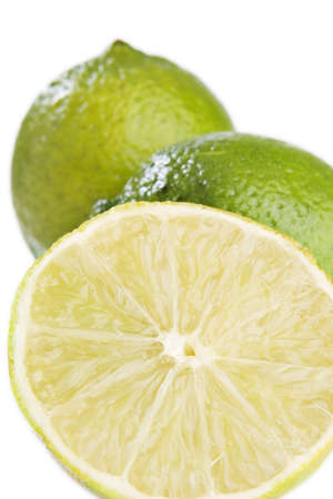 Limes sliced in half and whole