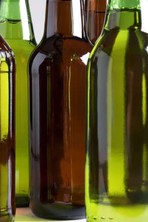 Bottles of beer against a white backgroundの写真素材