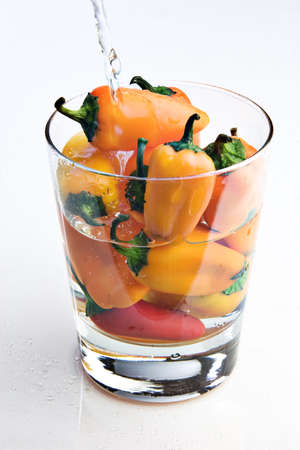 Peppers in a glassの写真素材