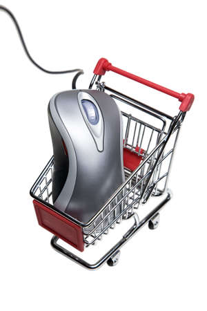 Computer mouse in a miniature-shopping cart.の写真素材