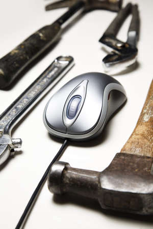 computer mouse and old tools