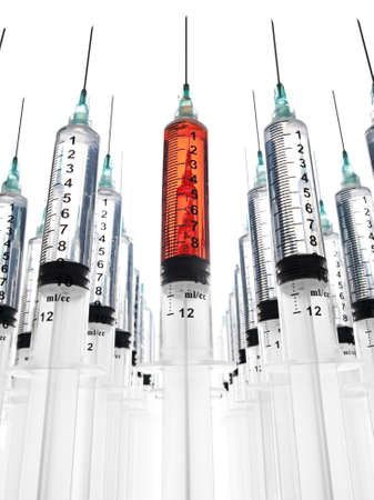 Rows of syringes, one filled with blood の写真素材