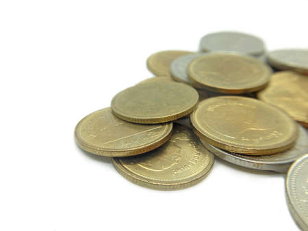 gold and silver coins of Thailand on white backgroundの写真素材