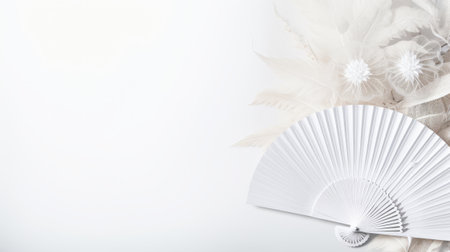 A white fan and white flowers on a white background. The fan is paper and open. The flowers are large and white. The background is white and fades to gray. A clean and elegant image for fan, flower, or white themes.の素材