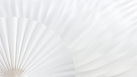 An elegant and minimalist image of a white paper fan on a light gray background. The fan is composed of thin, curved lines that create a sense of depth and dimension.の素材
