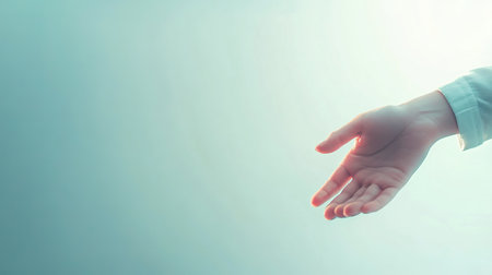 A gentle hand reaches out to offer support during a challenging time, embodying compassion and understanding for those in need of comfort and reassurance.の素材