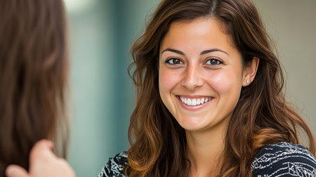 A cheerful staff member expresses gratitude to a customer after a positive interaction, highlighting the importance of service and support in fostering relationships.の素材