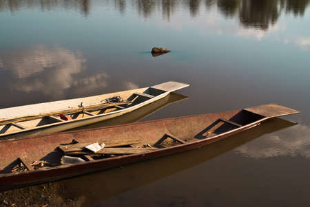 Two old style boats on the bankの写真素材