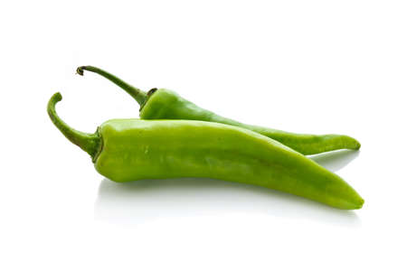 Green chili isolated on white backgroundの写真素材
