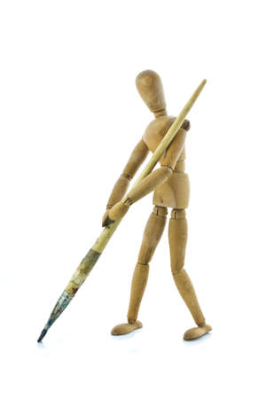 Mannequin hold the painbrush and paint somethinf on the floorの写真素材