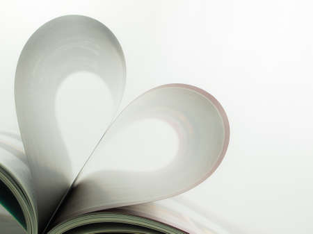 Magazine's page folded as a heartの写真素材