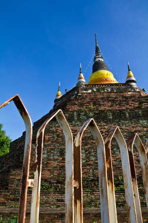 Historical pagoda in Wat Rajaburana, landmark in Phitsanulok, Thailandの写真素材