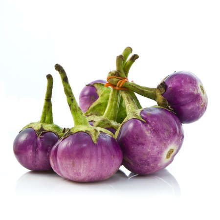 Violet eggplant isolated on white backgroundの写真素材