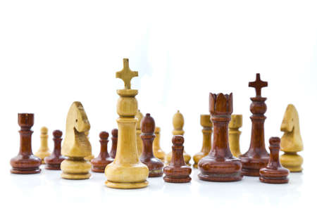 Wooden chess teams on white backgroundの写真素材