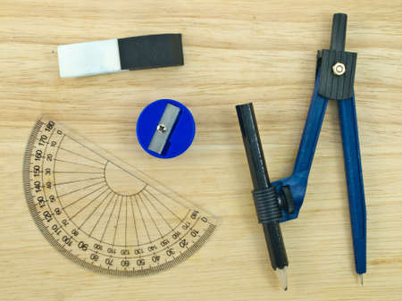 Stationary tools on wood background