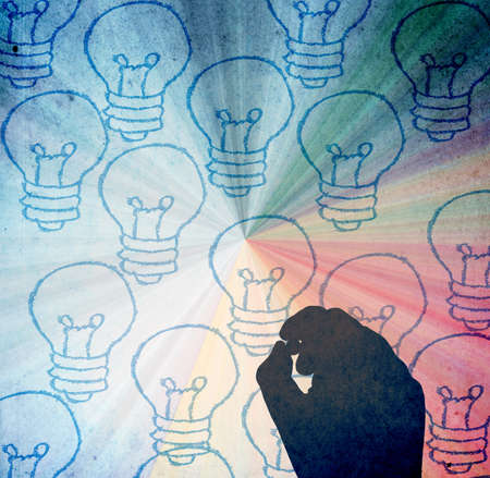 Hand and light bulbsの写真素材