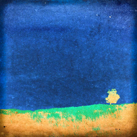 Grunge background, tree on the hillの写真素材