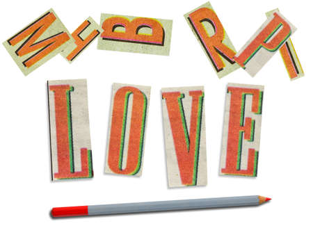 Love in cut letters with color pencilの写真素材