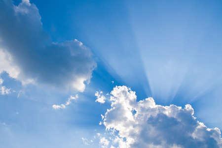 Beam of light behind the clouds