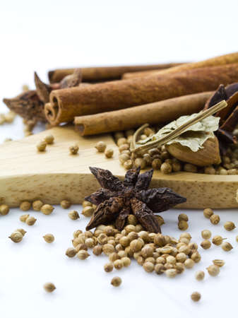 Mixed spices in wooden spoon