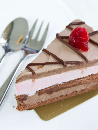 Chocolate cake on white plateの写真素材