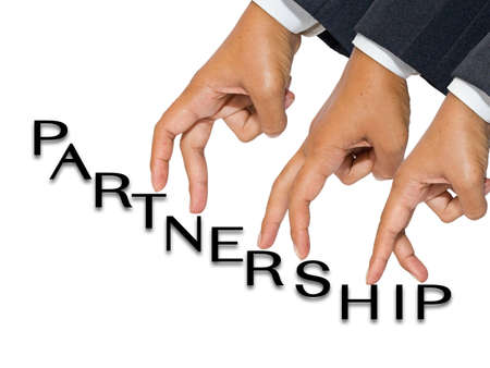 Businessman hand as finger walking for partnership conceptの写真素材