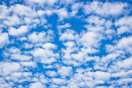 Altocumulus clouds on blue skyの写真素材