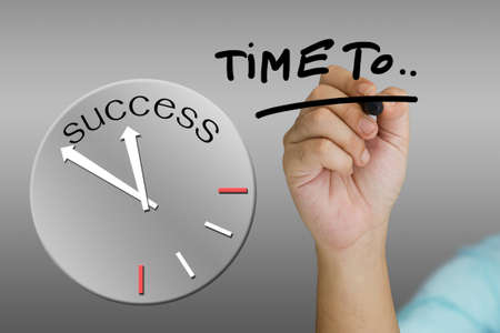 Hand underline a word with success clockの写真素材