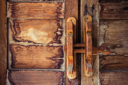 Obsolete wooden door bolt, Thai tradition