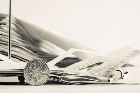 Coin with receipts in paperの写真素材