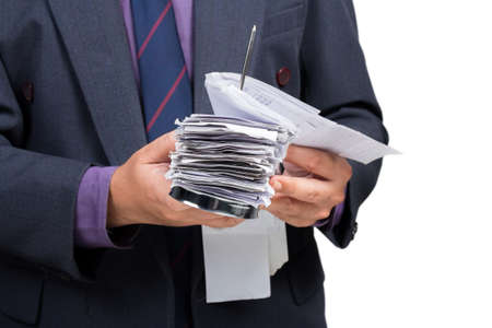 Businessman check a lot of bills in handの写真素材