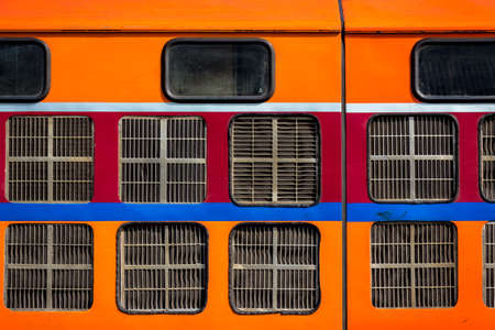 Abstract orange train, closeup at ventilate windowの写真素材
