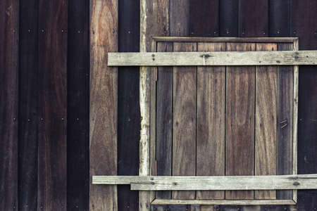 Abstract black wood house with window closed permanentlyの写真素材