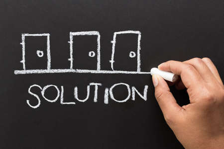 Hand drawing doors as symbol of business solutionの写真素材