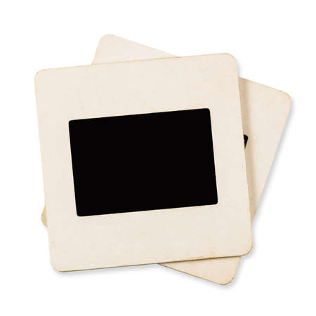Old slide film mounts made of paper isolated on white background