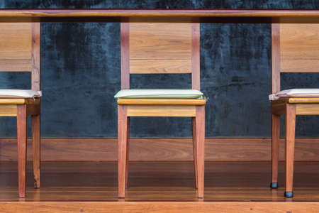 Wood chairs with seat pillow on the wood porchの写真素材