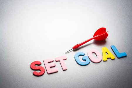 Wood letters of Set Goal word with dartの写真素材