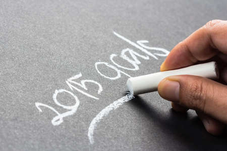 Hand writing 2015 goals topic with chalkの写真素材