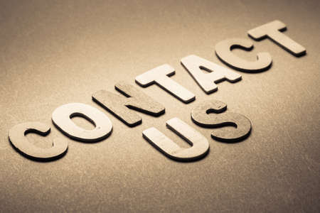 Wood letters as Contact Us wordの写真素材