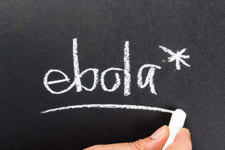 Hand writing Ebola topic on chalkboardの写真素材