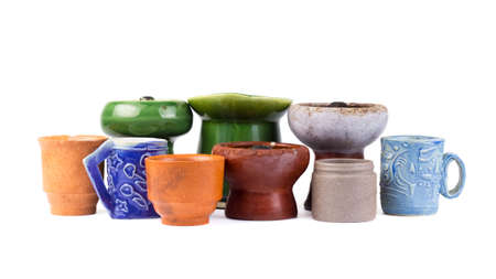 Group of old earthenware isolated on white background