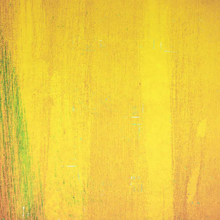 Yellow painting on canvas textureの写真素材