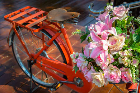 Artificial bouquet of old bicycleの写真素材
